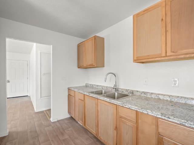 2557 Jackson St, Selma, CA 93662 - kitchen with wood finished floors and light brown cabinetry