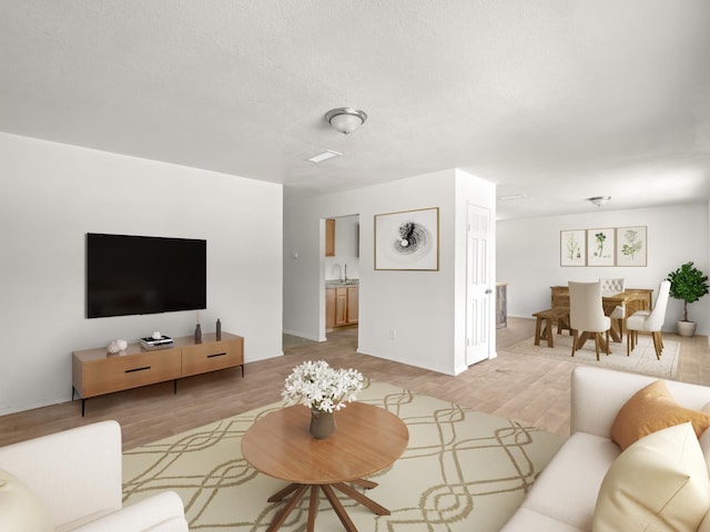 2557 Jackson St, Selma, CA 93662 - living room with light wood-style flooring