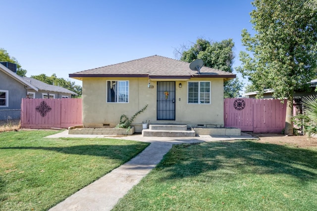 448 E Tuolumne St, Fresno, CA 93706 - bungalow-style home featuring stucco siding and roof with shingles