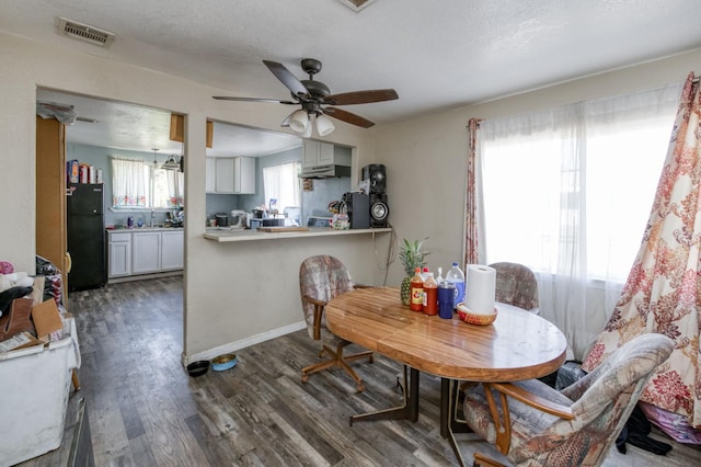 448 E Tuolumne St, Fresno, CA 93706 - dining space with wood finished floors and a ceiling fan