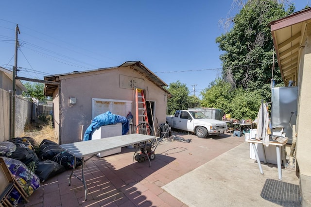 448 E Tuolumne St, Fresno, CA 93706 - view of patio / terrace featuring an outbuilding