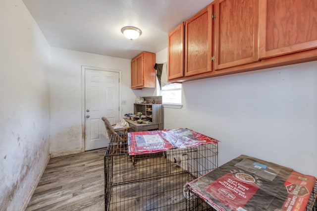 448 E Tuolumne St, Fresno, CA 93706 - kitchen featuring light wood-type flooring and brown cabinets