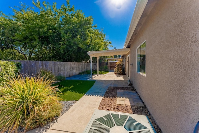 1963 Rialto Ct, Clovis, CA 93611 - fenced backyard with a patio