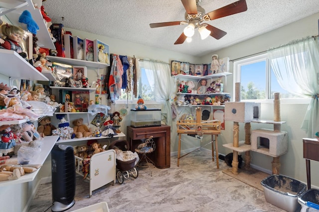 44810 Douglas Rd S, Coarsegold, CA 93614 - office space featuring healthy amount of natural light, a ceiling fan, and a textured ceiling