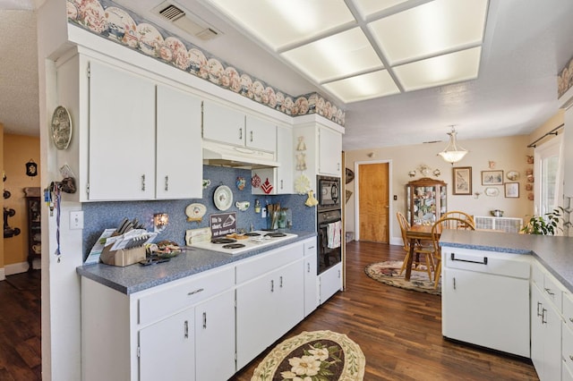44810 Douglas Rd S, Coarsegold, CA 93614 - kitchen with decorative backsplash, black appliances, dark wood-type flooring, under cabinet range hood, and white cabinets