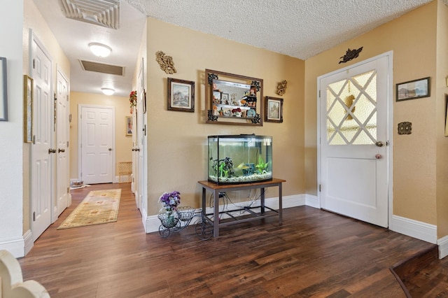 44810 Douglas Rd S, Coarsegold, CA 93614 - entrance foyer with wood finished floors and a textured ceiling