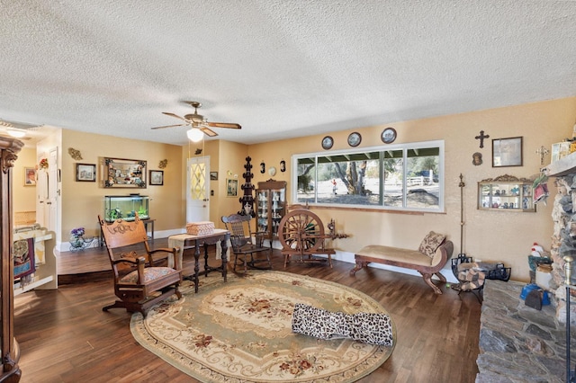 44810 Douglas Rd S, Coarsegold, CA 93614 - dining room featuring dark wood-style flooring, a textured ceiling, and a ceiling fan