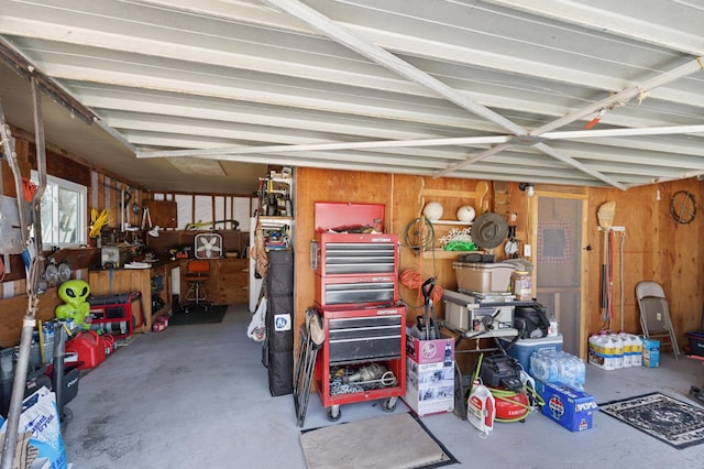 44810 Douglas Rd S, Coarsegold, CA 93614 - garage with wood walls and a workshop area