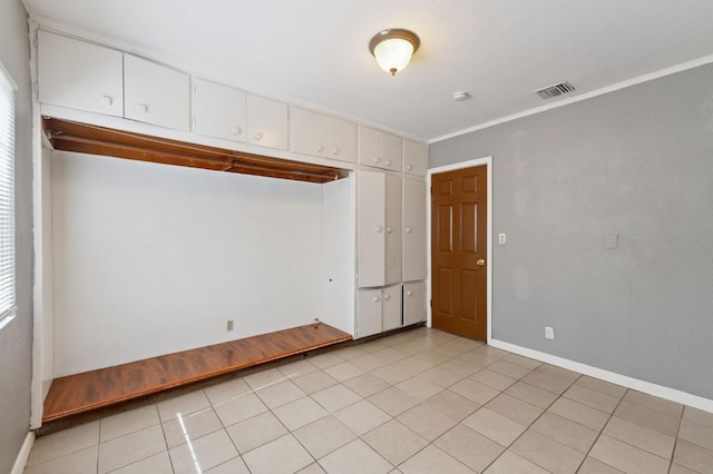 3924 E Iowa Ave, Fresno, CA 93702 - unfurnished room featuring light tile patterned flooring and a smoke detector