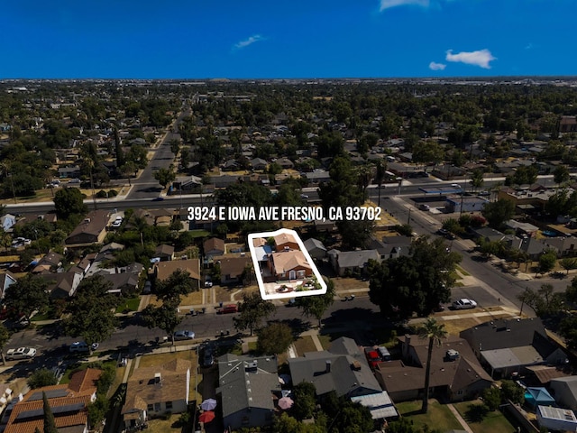 3924 E Iowa Ave, Fresno, CA 93702 - aerial overview of property's location with nearby suburban area and property parcel outlined