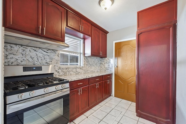 3924 E Iowa Ave, Fresno, CA 93702 - kitchen with stainless steel gas range oven, under cabinet range hood, dark brown cabinets, decorative backsplash, and light stone counters