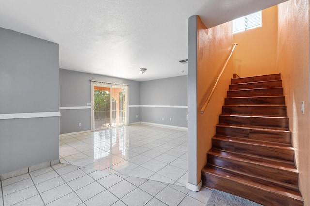 3924 E Iowa Ave, Fresno, CA 93702 - stairs featuring tile patterned floors