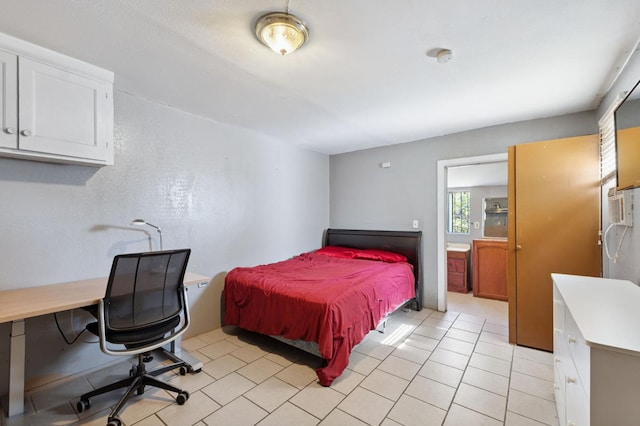 3924 E Iowa Ave, Fresno, CA 93702 - bedroom featuring an office area and light tile patterned floors
