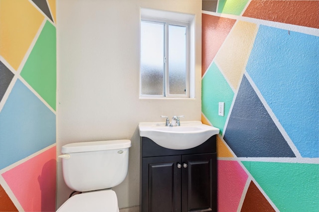 3924 E Iowa Ave, Fresno, CA 93702 - half bathroom featuring toilet and vanity