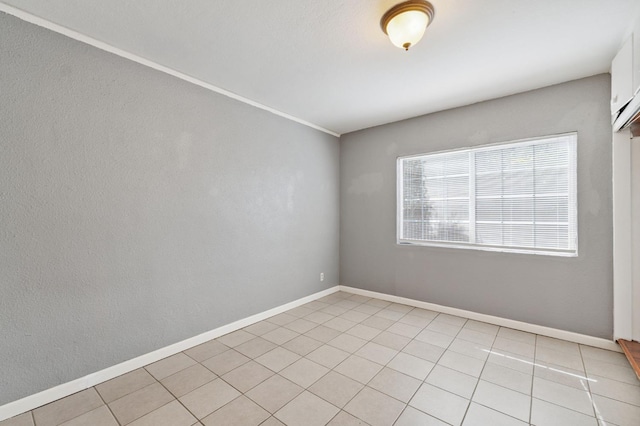 3924 E Iowa Ave, Fresno, CA 93702 - unfurnished room featuring baseboards and light tile patterned floors