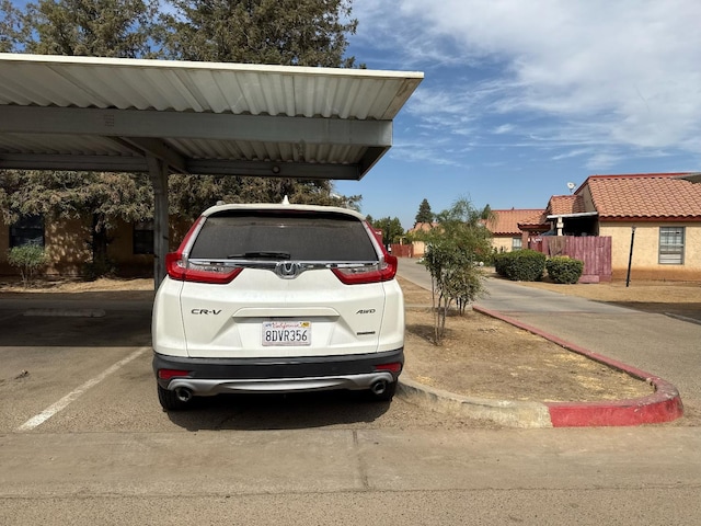 1405 E Cypress Ave Unit 217, Reedley, CA 93654 - view of covered parking lot