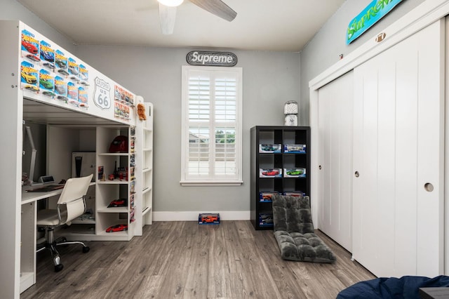 1397 N Redington Ave, Clovis, CA 93619 - bedroom with a desk, wood finished floors, a closet, and ceiling fan