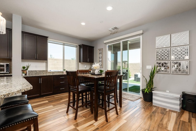 1397 N Redington Ave, Clovis, CA 93619 - dining space featuring recessed lighting, light wood-style flooring, and plenty of natural light