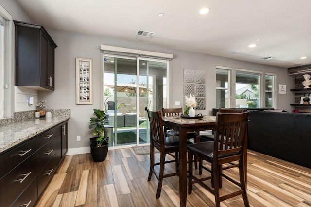 1397 N Redington Ave, Clovis, CA 93619 - dining area with light wood-style flooring and recessed lighting