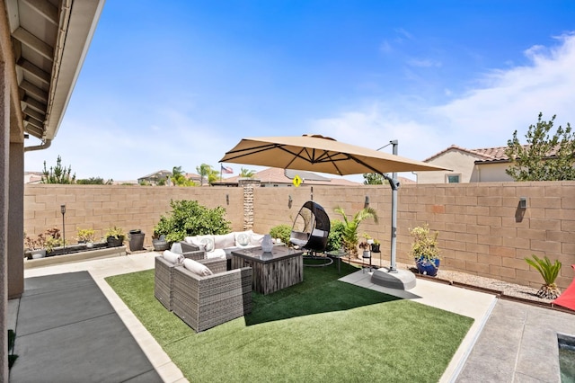 1397 N Redington Ave, Clovis, CA 93619 - fenced backyard featuring a patio and an outdoor hangout area