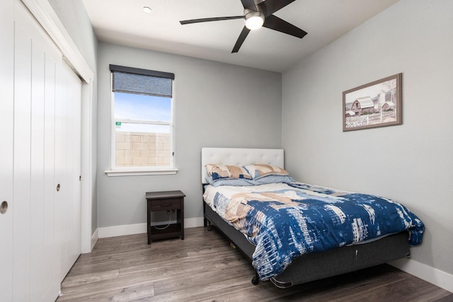 1397 N Redington Ave, Clovis, CA 93619 - bedroom featuring a closet, wood finished floors, and a ceiling fan