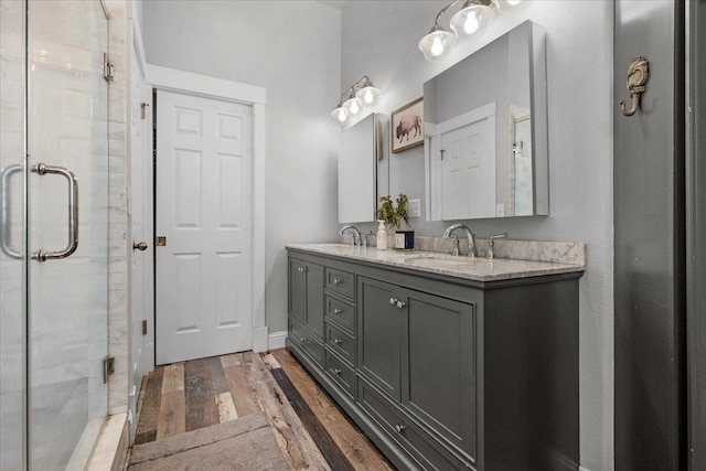 34503 Backbone Rd, Auberry, CA 93602 - bathroom with wood finished floors, double vanity, and a stall shower
