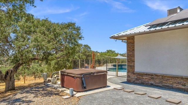 34503 Backbone Rd, Auberry, CA 93602 - view of patio / terrace with a hot tub