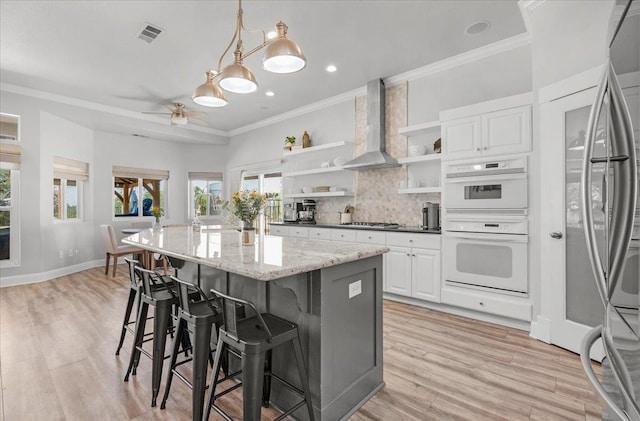 34503 Backbone Rd, Auberry, CA 93602 - kitchen featuring open shelves, stainless steel fridge, white double oven, crown molding, and tasteful backsplash
