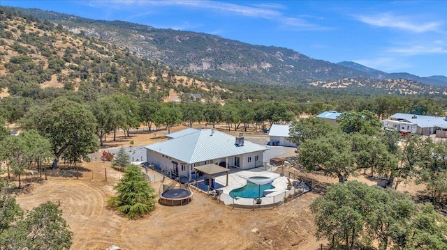 34503 Backbone Rd, Auberry, CA 93602 - view of subject property with a mountain backdrop and a pool area
