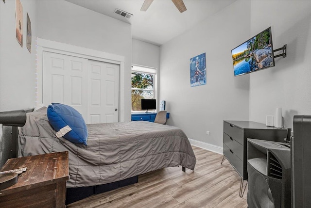 34503 Backbone Rd, Auberry, CA 93602 - bedroom with light wood-style flooring, a closet, and ceiling fan