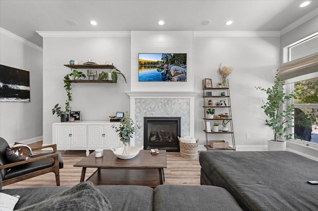 34503 Backbone Rd, Auberry, CA 93602 - living room featuring ornamental molding, light wood-style floors, a glass covered fireplace, and recessed lighting