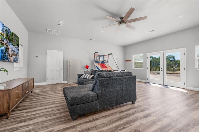 34503 Backbone Rd, Auberry, CA 93602 - living area with wood finished floors, ceiling fan, french doors, and recessed lighting