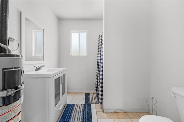 34503 Backbone Rd, Auberry, CA 93602 - full bathroom with water heater, vanity, tile patterned floors, and curtained shower