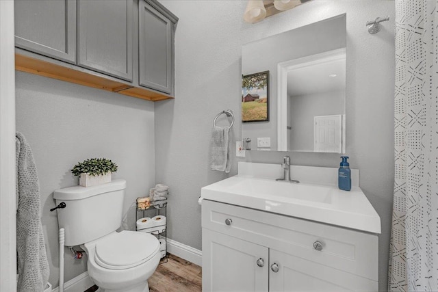 34503 Backbone Rd, Auberry, CA 93602 - full bathroom with vanity, wood finished floors, and a shower with shower curtain