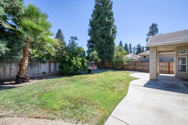 5484 W El Paso Ave, Fresno, CA 93722 - fenced backyard featuring a patio