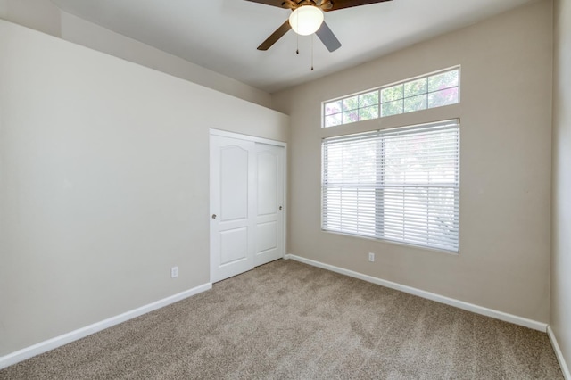 5484 W El Paso Ave, Fresno, CA 93722 - unfurnished bedroom featuring carpet, a closet, and a ceiling fan