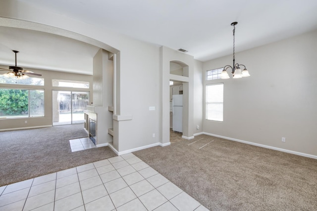 5484 W El Paso Ave, Fresno, CA 93722 - spare room with light colored carpet, plenty of natural light, and a ceiling fan