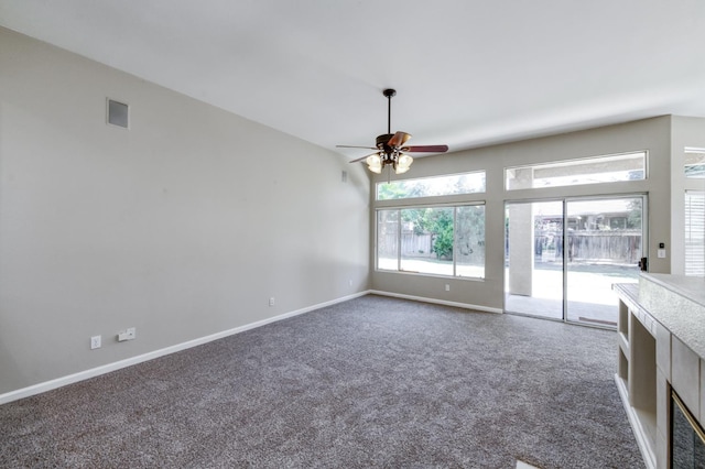 5484 W El Paso Ave, Fresno, CA 93722 - unfurnished living room with a ceiling fan and carpet
