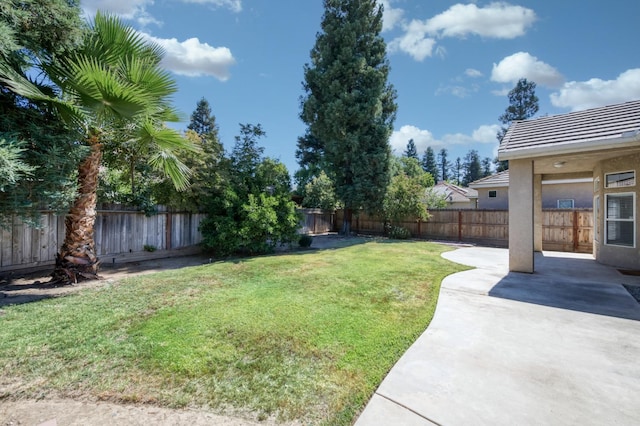 5484 W El Paso Ave, Fresno, CA 93722 - fenced backyard featuring a patio area