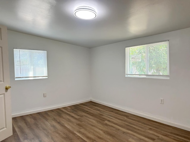 2723 E Lansing Way, Fresno, CA 93726 - spare room with wood finished floors and baseboards