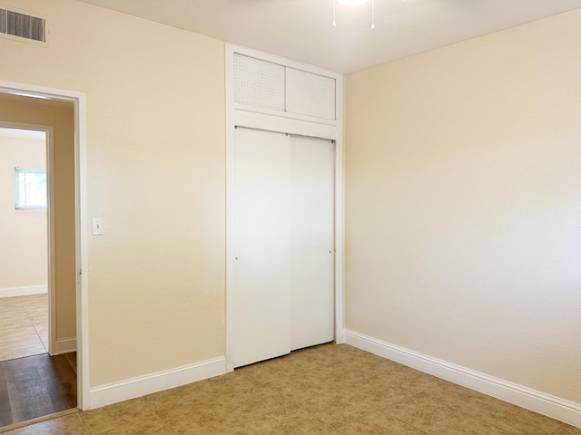 2723 E Lansing Way, Fresno, CA 93726 - unfurnished bedroom featuring baseboards and a closet