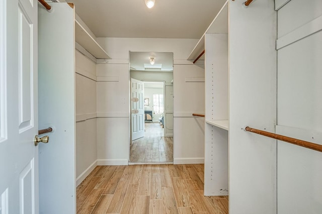 6355 N Cleo Ave, Fresno, CA 93722 - spacious closet with light wood-style floors