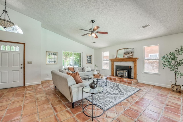 6355 N Cleo Ave, Fresno, CA 93722 - living area with a textured ceiling, ceiling fan, and lofted ceiling