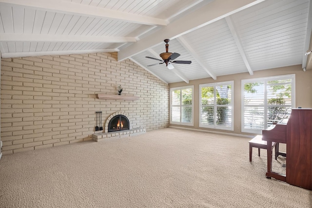 1702 W Bullard Unit 105, Fresno, CA 93711 - unfurnished living room featuring brick wall, carpet flooring, healthy amount of natural light, and a brick fireplace