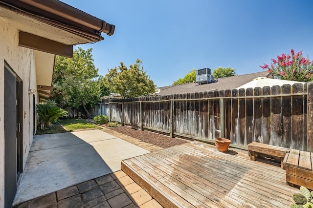 1702 W Bullard Unit 105, Fresno, CA 93711 - deck with a fenced backyard and a patio