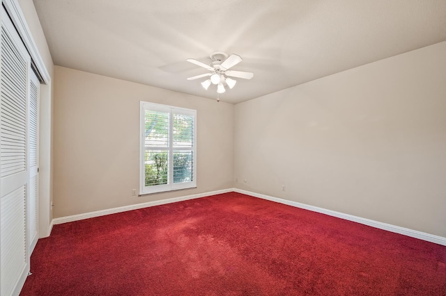 1702 W Bullard Unit 105, Fresno, CA 93711 - unfurnished bedroom featuring dark carpet, a closet, and a ceiling fan