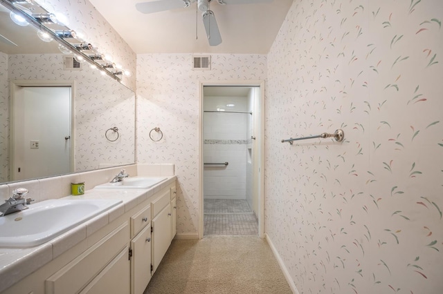1702 W Bullard Unit 105, Fresno, CA 93711 - full bath with double vanity, wallpapered walls, a tile shower, and a ceiling fan