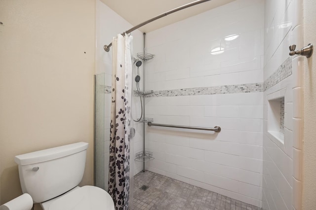 1702 W Bullard Unit 105, Fresno, CA 93711 - bathroom featuring toilet and tiled shower