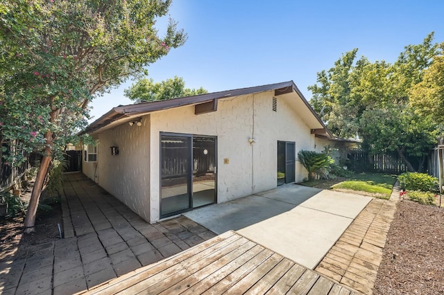 1702 W Bullard Unit 105, Fresno, CA 93711 - back of property with a patio and stucco siding