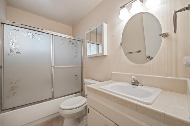 1702 W Bullard Unit 105, Fresno, CA 93711 - bathroom featuring shower / bath combination with glass door, vanity, and tile patterned flooring